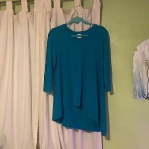 Very nice dressy shirt with quarter sleeves. Teal color